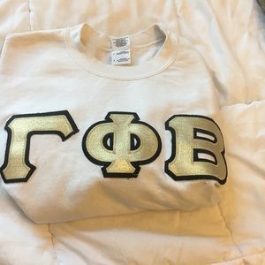 Gold sewn in gamma phi beta letters